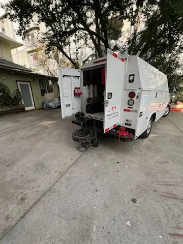 Magnet Plumbing service vehicle on-site for Water Heater Repair in Hewlett Harbor